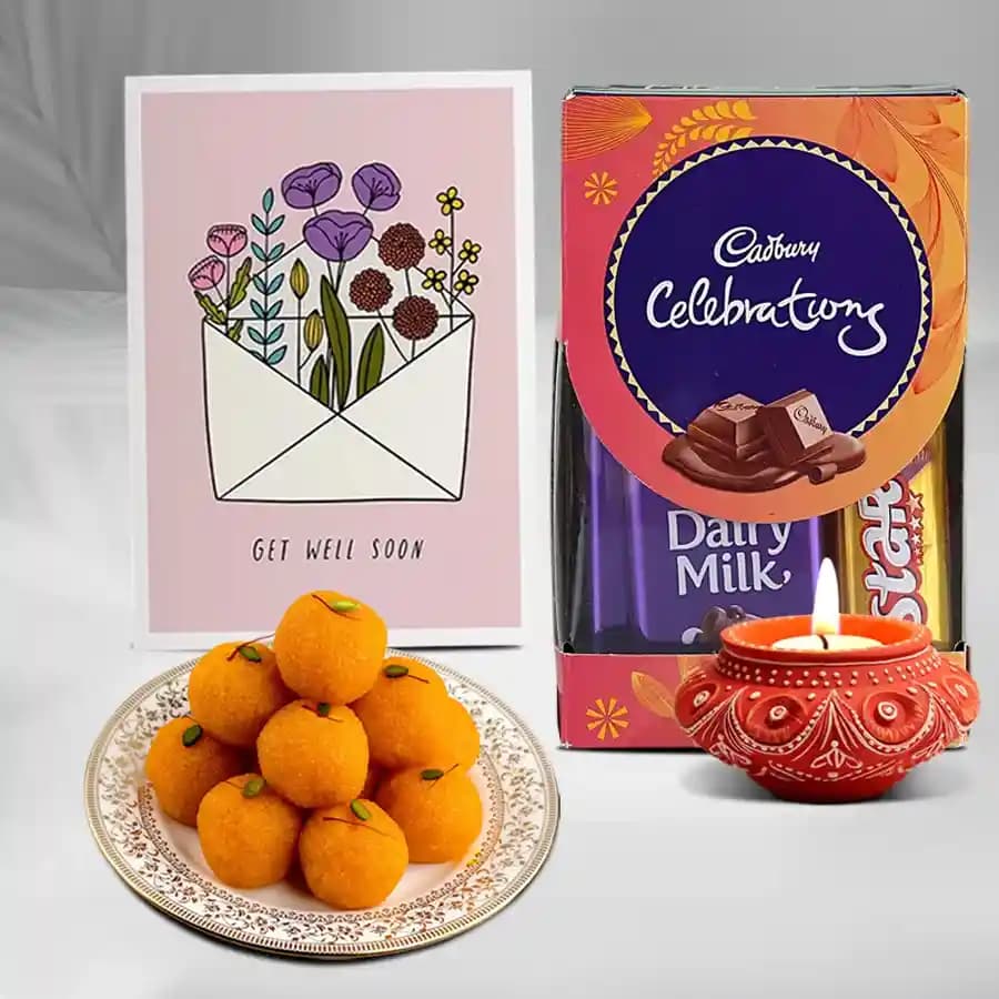Diwali Essentials Diya, Sweets And Greetings