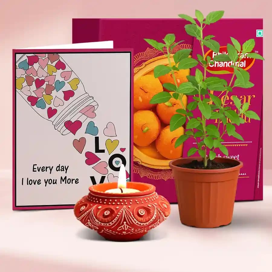 Festive Laddu, Tulsi, And Diya