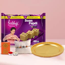 Elegant Gold-Plated Thali with Tasty Soan Papri and Rakhi 1