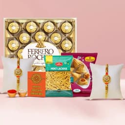 Lovely Golden Rakhi Pair with Ferrero Rocher n Snacks 1