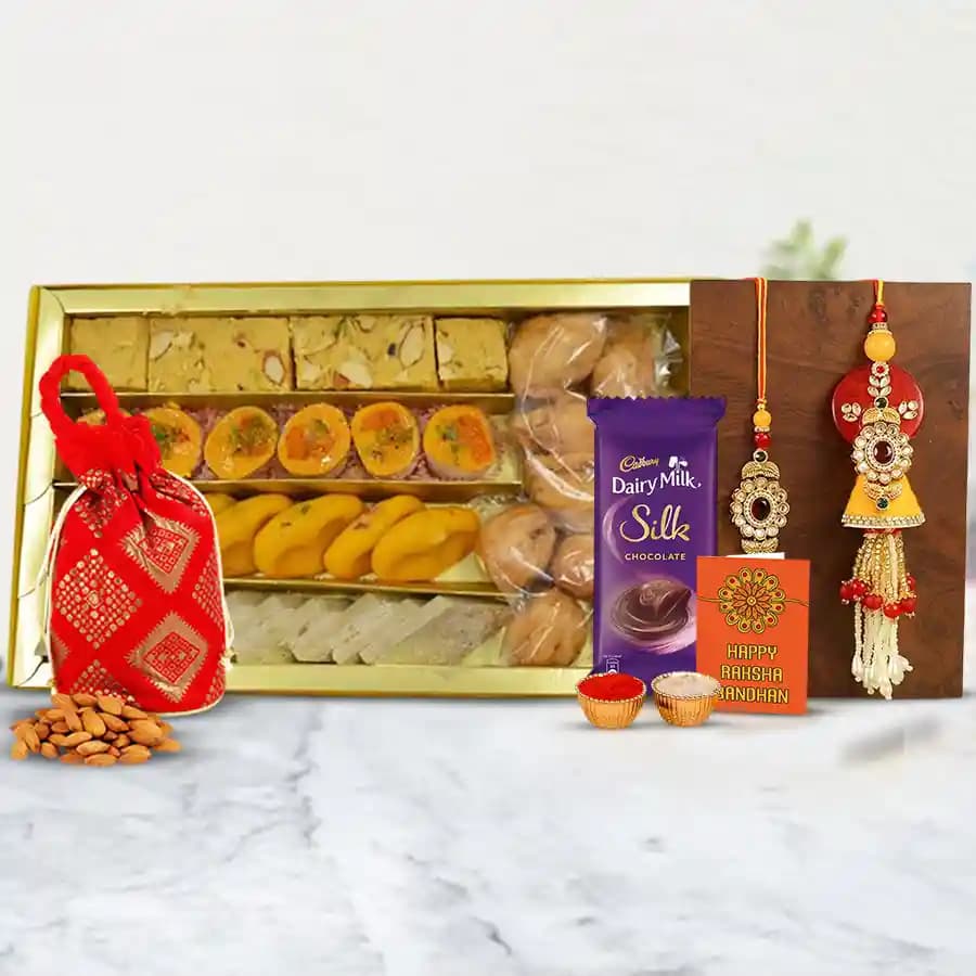 Attractive Bhaiya Bhabhi Rakhi with Sweets N Gifts Combo