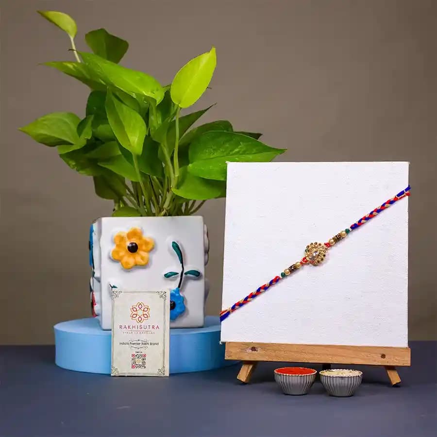 Cherished Moments Kundan Rakhi N Golden Pothos Combo