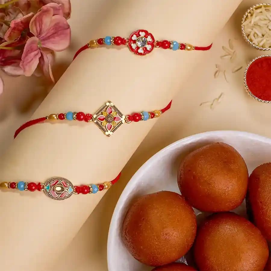Beautiful Kundan Rakhi Trio N Gulab Jamun Delight
