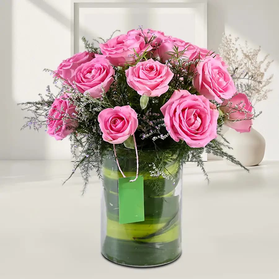Beautiful Display of Pink Roses in Glass Vase
