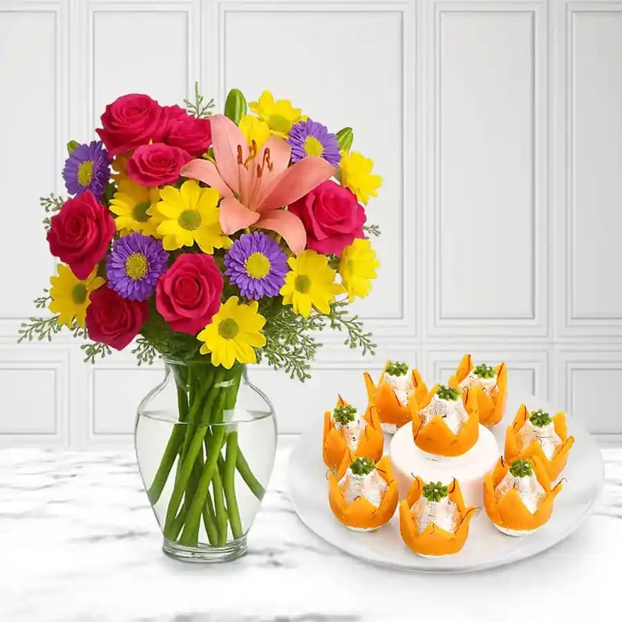 Badam Kalash from Dadus with a Mixed Flower Arrangement